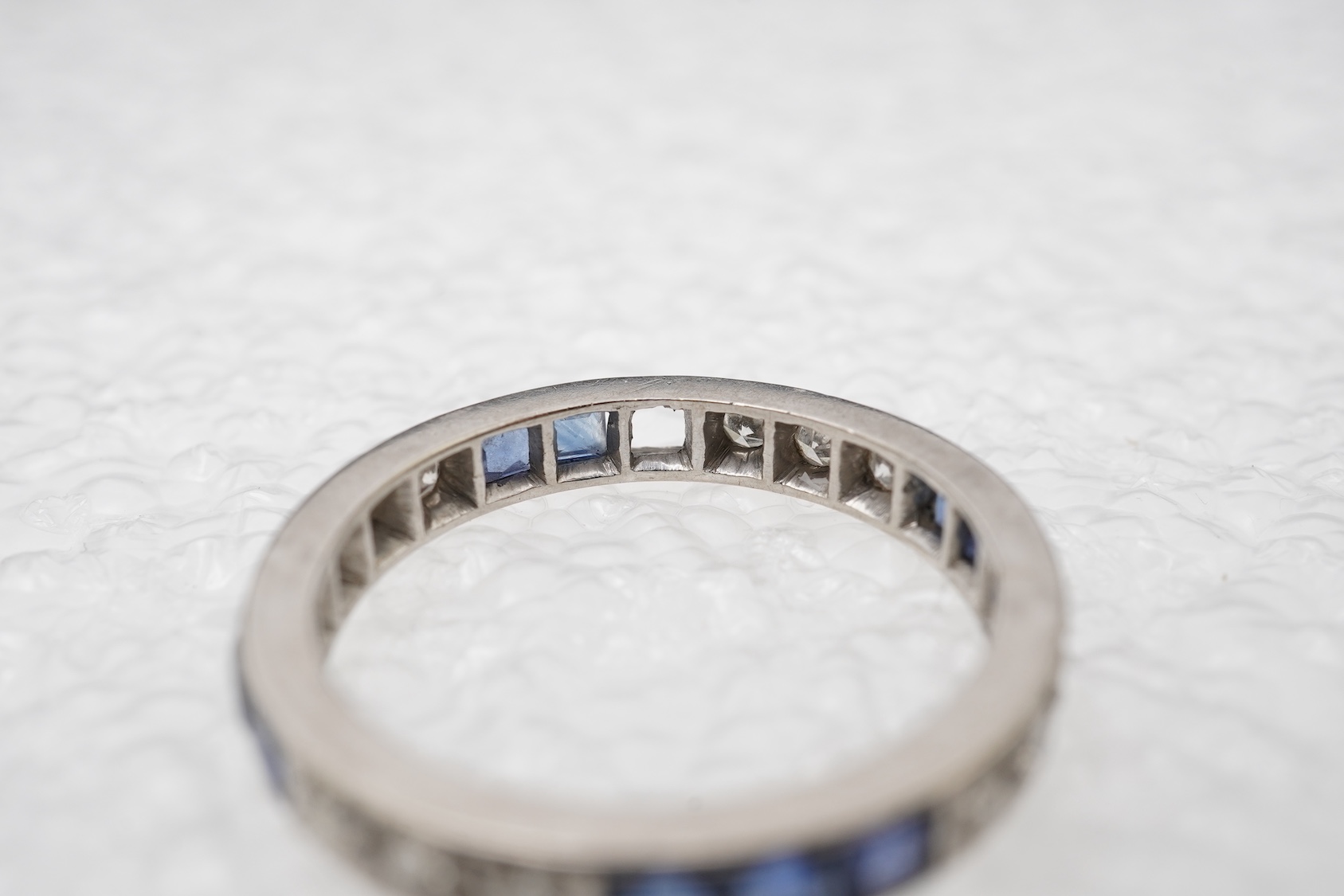 An Art Deco sapphire and diamond eternity ring, 1930s